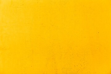 Yellow natural stone texture and seamless background