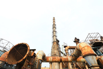 Unused and abandoned metal pipes in factories