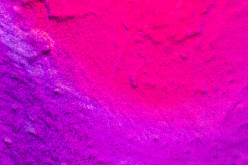 Obraz premium Beautiful bright colorful street art graffiti background. Abstract creative spray drawing fashion colors on the walls of the city. Urban Culture, orange , pink , purple , crimson, blue texture