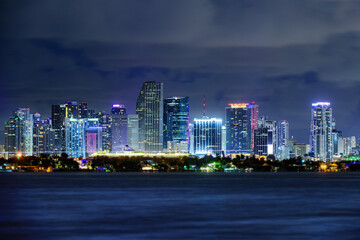 Miami business district, lights and reflections of the city. Miami night downtown, city Florida.