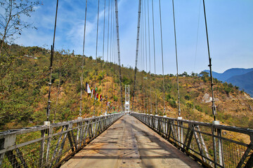 "Singshore Bridge" which is second highest suspended bridge in asia located in Pelling, Sikkim, India.