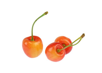 close up on yellow and red cherries isolated on white background
