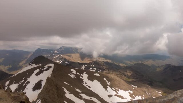 Rolling clouds over Mount Mulhacen as seen from Veleta, Sierra Nevada, Spain. Scenic time-lapse