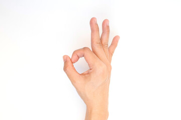 Naklejka premium Female hand showing gesture on white background. Body language concept.
