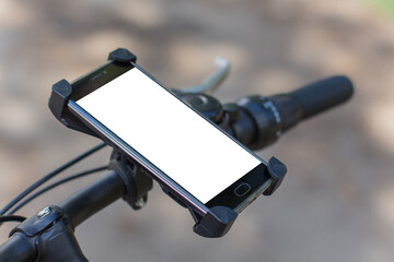 smartphone on the handlebars of a bicycle