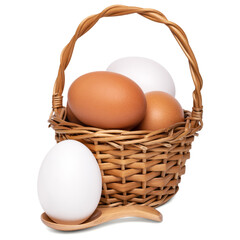 Brown and white eggs in a wooden basket and spoon