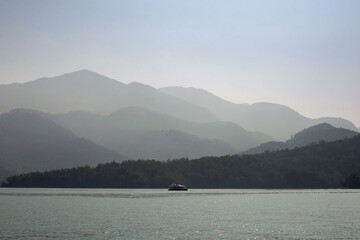 Morning lake with mountain in background