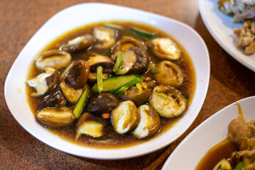 fried chinese shitake mushroom on wooden table