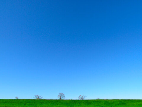 Green Hill And Blue Sky