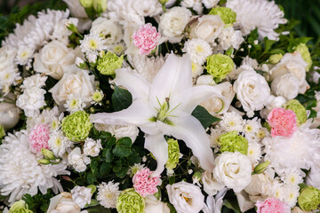 The harmony of white and blue flowers in flower basket