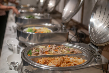 several food on buffet line catering