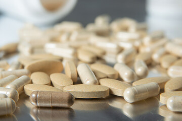 Vitamin  tablets suppliment on table