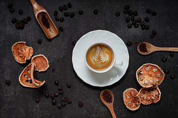 Cup of coffee and Coffee composition on black background. Copy space. Top view. Flat lay.
