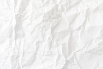 Top view of white crumpled paper background.