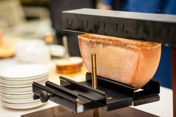 Swiss Raclette. Warm Melted Swiss Cheese