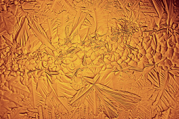 Obraz premium golden ice background, abstract yellow background, cold seasonal unusual ice, holiday texture