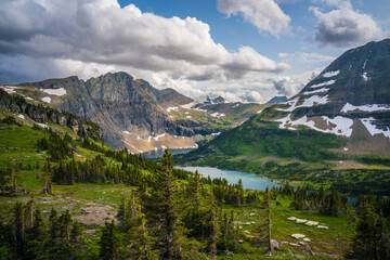 The hidden lake and mountains in Glacier National Park, in Montana, on a cloudy day.