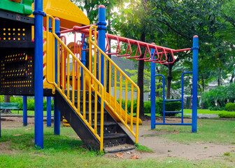 Fototapeta na wymiar Colorful Children playground in the park, big plastic toy set.