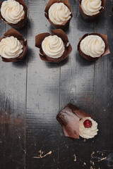 Cooking delicious homemade muffins with strawberry jam. Homemade baking.