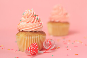 Pink cupcakes on a pink background