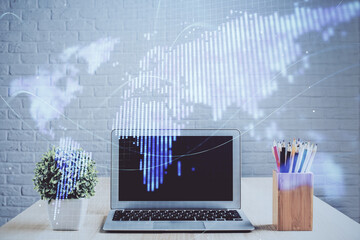 Double exposure of business theme icons and work space with computer background. Concept of success.