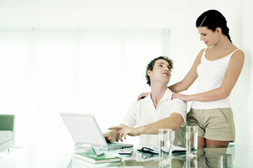 Fototapeta premium Man sharing some interesting information with his girlfriend