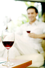 Man enjoying a glass of red wine