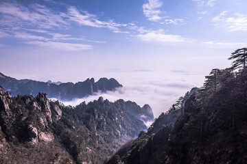 Naklejka na ściany i meble Wonderful and curious sea of clouds and beautiful Huangshan mountain landscape in China. 