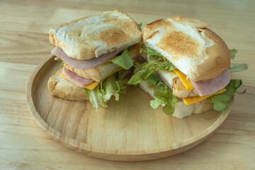 home made sandwich on wood table natural light