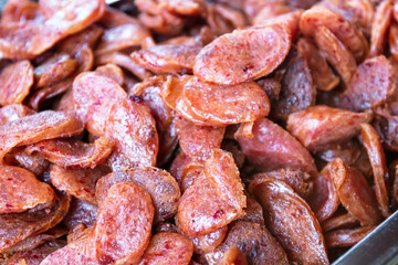 Chinese sausage fried on food tray; simply and delicious.