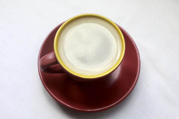 Cup of black coffee with foam