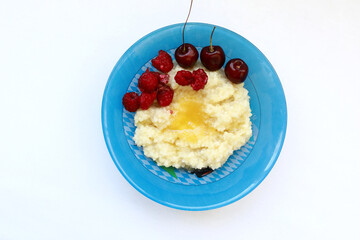Millet porridge with honey and berries