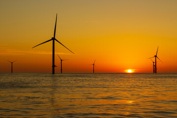 Beautiful sunset at the North Sea offshore wind farm