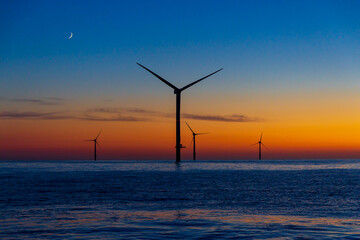 Beautiful sunset at the North Sea offshore wind farm