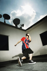 Young man breakdancing