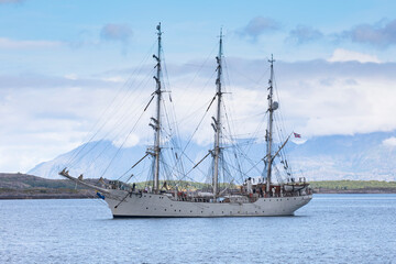 Fototapeta na wymiar Old sail ship Christian Radich arrives at Bronnoysund harbor in Nordland county