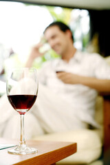 Man enjoying a glass of red wine
