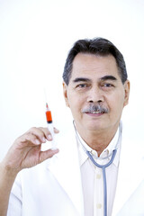 Doctor holding a syringe