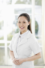 Female doctor smiling at the camera