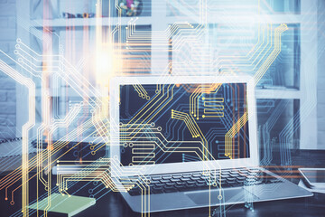 Multi exposure of table with computer and world map hologram. International data network concept.