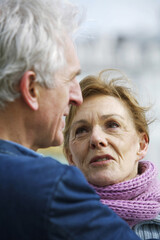 Woman looking at a man talking about some matters