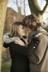 Fototapeta premium Couple facing each other, nose to nose