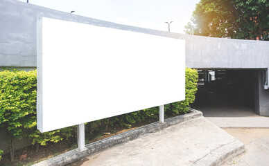 Mockup Large white blank billboard or white promotion poster displayed on the outdoor against. Promotion information for marketing announcements and details. 