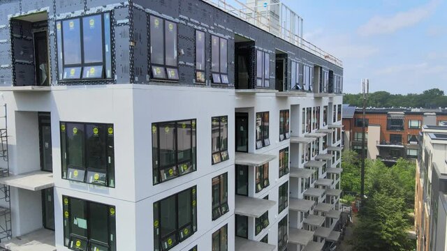 brand new building been constructed, construction zone of an apartment building aerial view