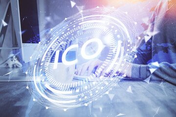 Blockchain theme hud with businessman working on computer on background. Concept of crypto chain....