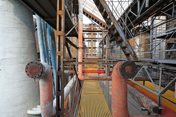 Unused and abandoned metal pipes in factories