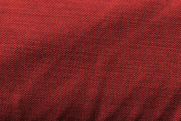 Highly detailled red jeans texture. Texture fabric red jeans background