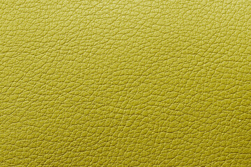 Yellow leather texture. Gently yellow leather surface for design and text. Glossy yellow skin