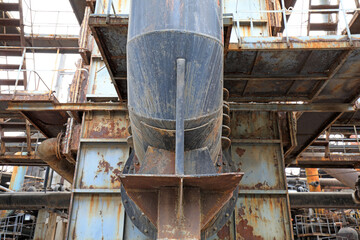 Unused and abandoned metal pipes in factories
