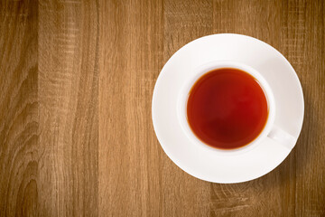 Cup of tea on wooden table . top view
